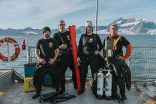 Scuba Diving Team on Arctic Sunrise in the Arctic