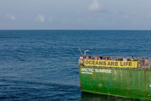 Banner Action Onboard the Arctic Sunrise in the Pacific Ocean