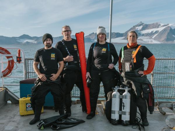 Scuba Diving Team on Arctic Sunrise in the Arctic